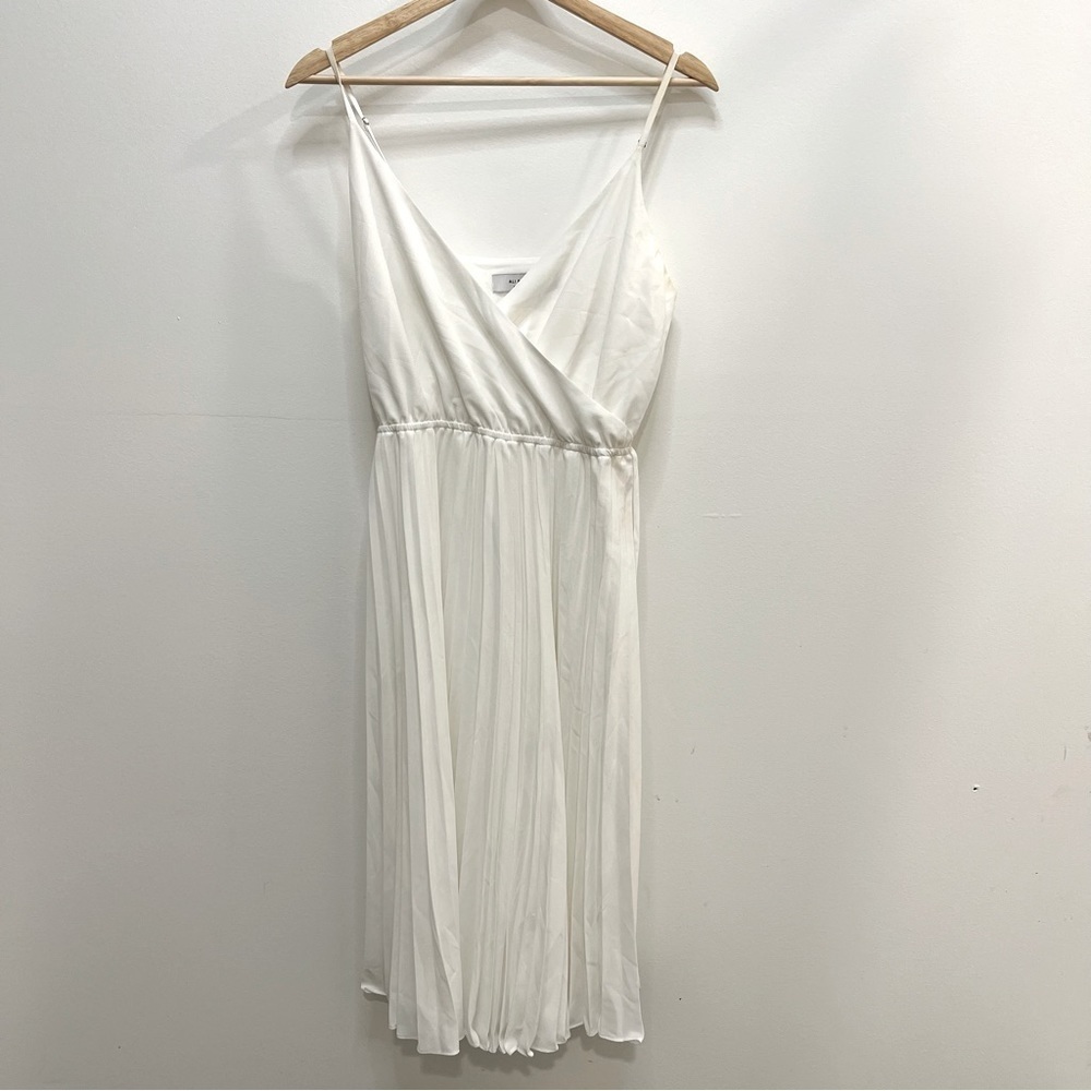 ALI and Jay white dress with pleated skirt